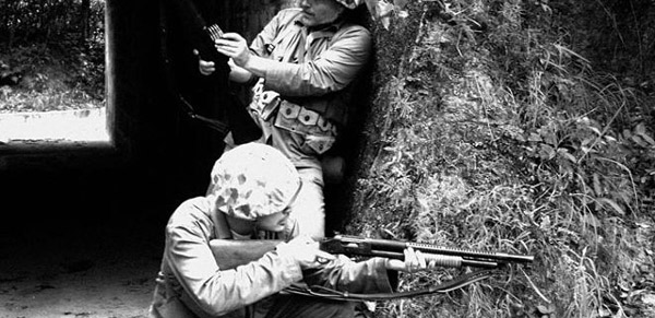 Army soldiers using a semi-automatic shotgun