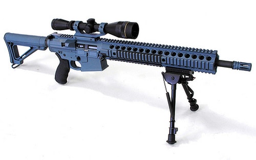 Black AR 15 bipod mounted on a long gun