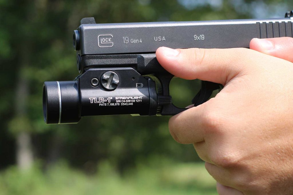 picture of a glock 19 with a flashlight attached