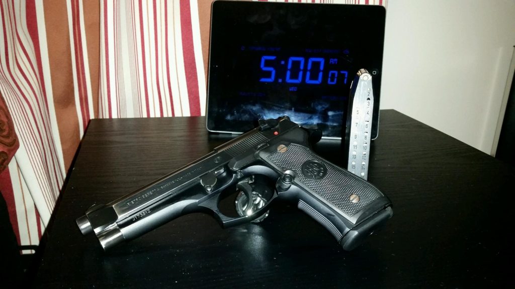 a picture of a Beretta M92FS as a night stand gun