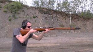 image of a man aiming his Mosin Nagant M91-30