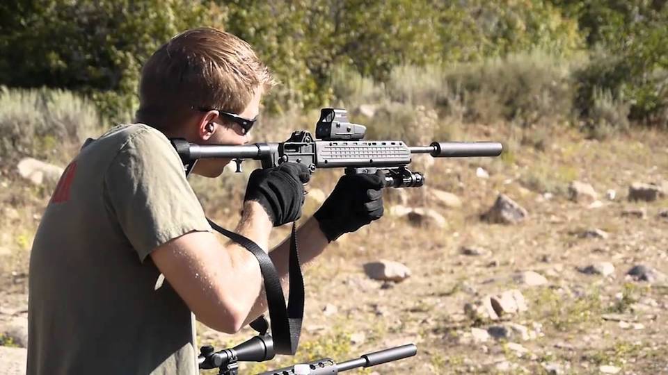 image of a man using Kel-Tec Sub-2000 in shooting