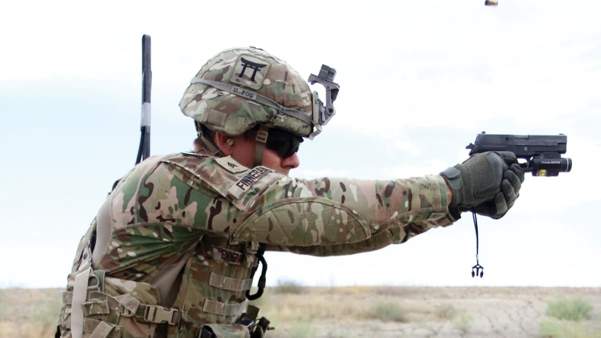 Soldier holding a sig p320