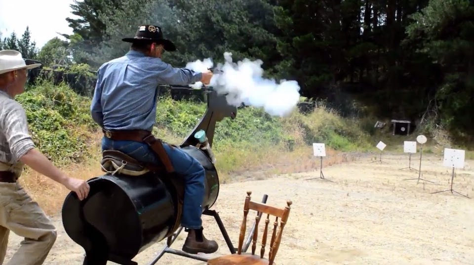 Cowboy action shooting in gun range