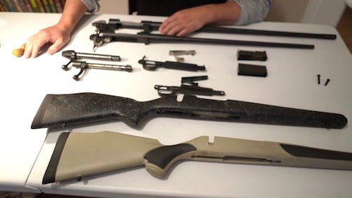 Weatherby Vanguard rifle disassembled with all parts displayed