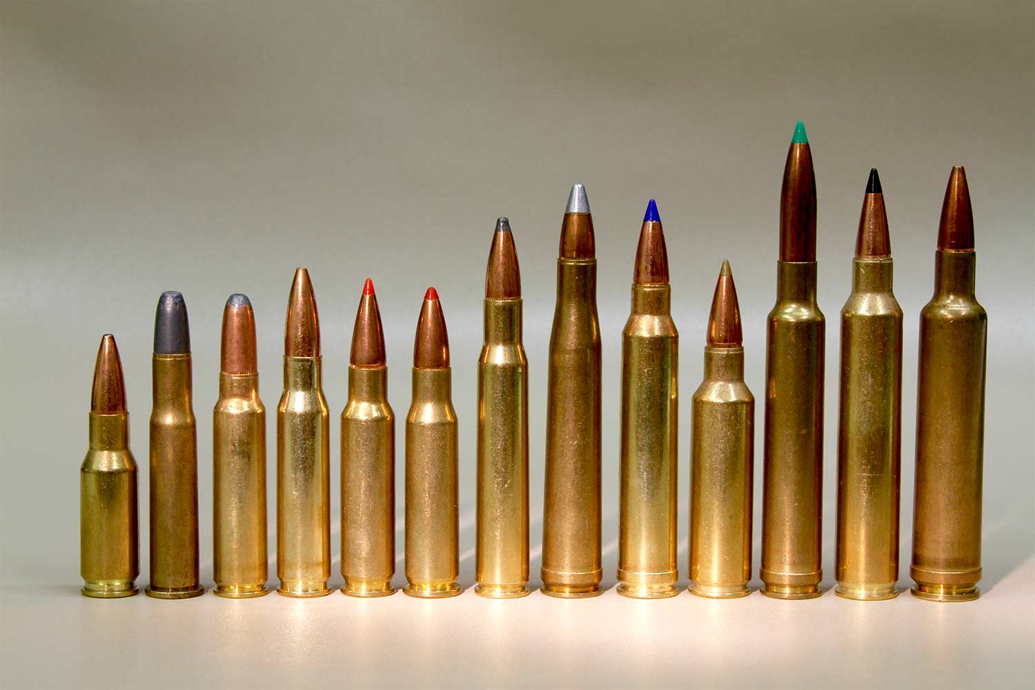 A picture of several different hunting rifle calibers