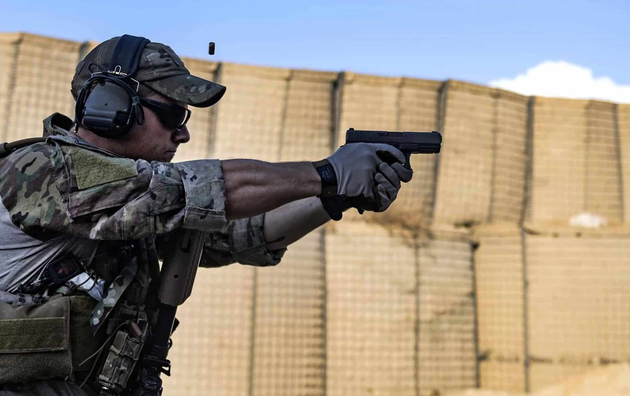 A picture of a man shooting a Glock 17 Gen 5