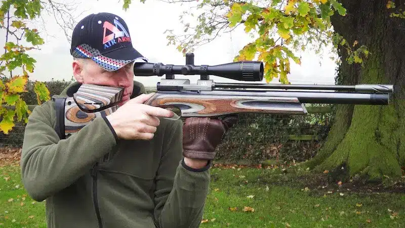 man shooting air rifle