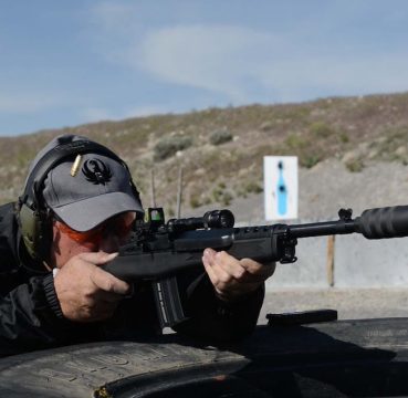 Ruger Mini 14 at the range with a suppressor